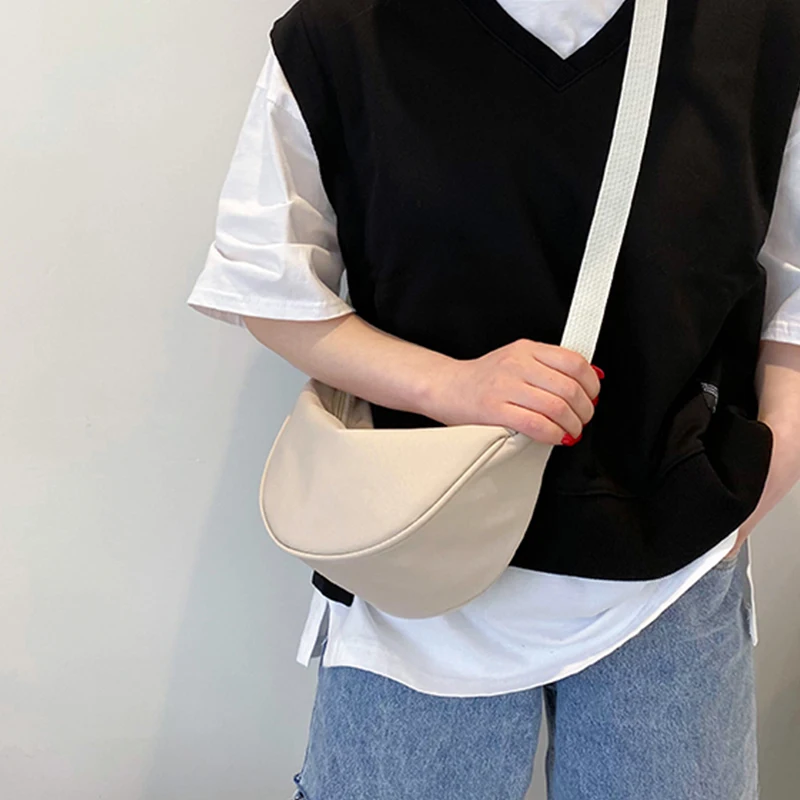 Women's single-shoulder bag - shaped like a dumpling, with a single zipper, can be worn diagonally across the shoulder. - Image 2
