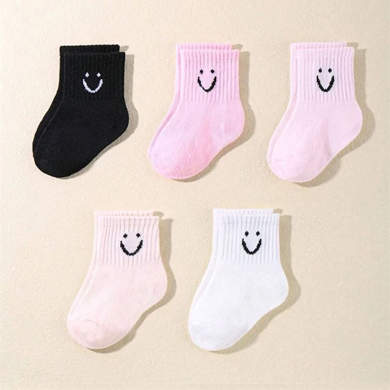 10 pairs of cute solid-color smiling face pattern children's mid-calf socks, suitable for boys and girls socks - Image 6