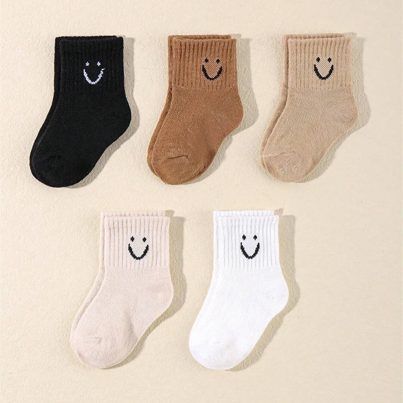 10 pairs of cute solid-color smiling face pattern children's mid-calf socks, suitable for boys and girls socks - Image 4