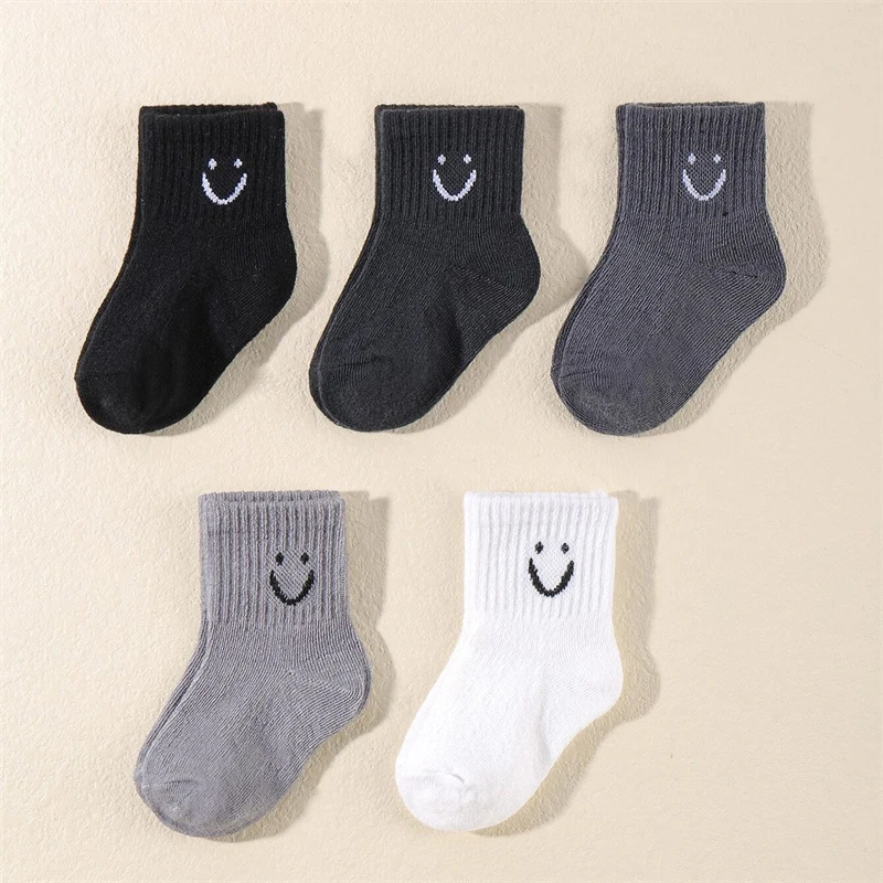 10 pairs of cute solid-color smiling face pattern children's mid-calf socks, suitable for boys and girls socks - Image 5